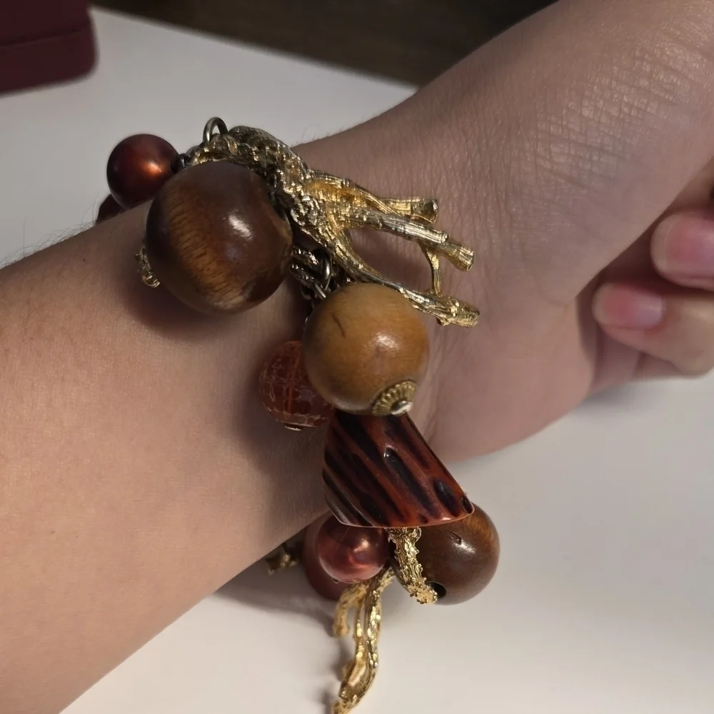 Bakelite gold tone charm bracelet